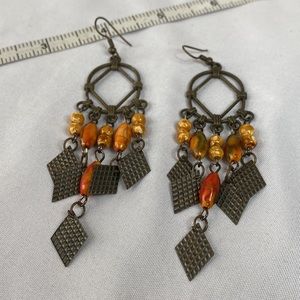 Metal dream catcher style dangle earrings